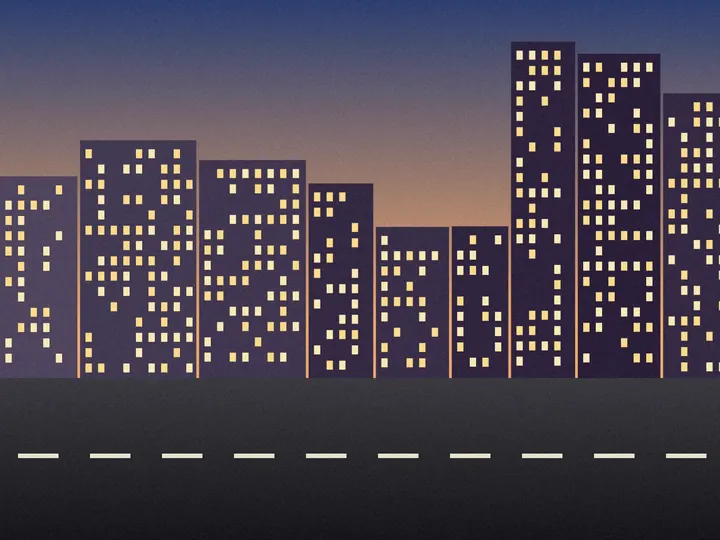 The same city street at dusk, saved as a smaller WebP.