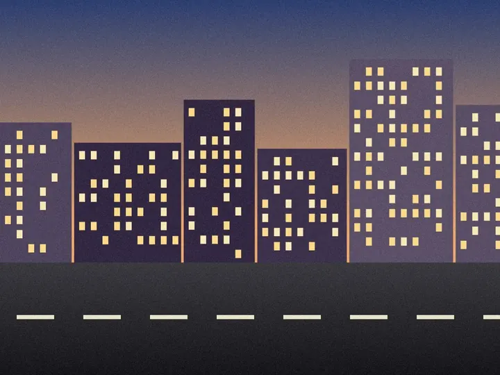 The same city street at dusk, saved as a JPG.
